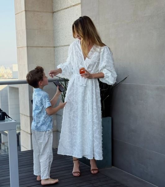 Саша Савельева с сыном - фото соцсети